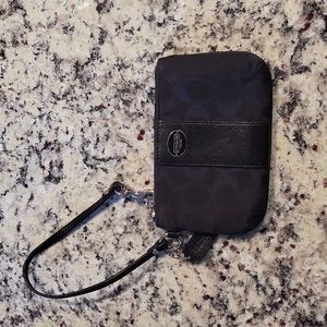 Small black Coach wristlet